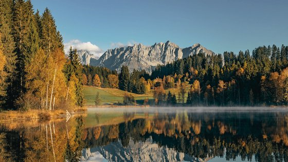 Schwarzsee in Kitzbühel mit Wildem Kaiser im Hintergrund Schwarzsee in Kitzbühel mit Wildem Kaiser im Hintergrund